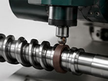 Raceway superfinishing a ground ball screw